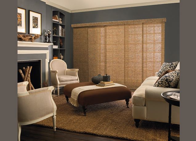 Hartford Study with navy walls and textured sliding panel tracks.